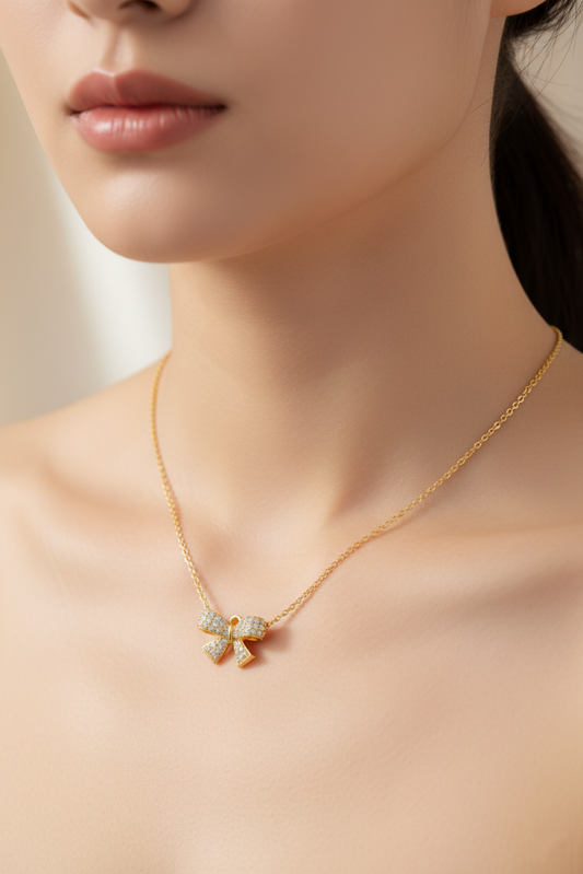 Stainless Steel Crystal Bow Pendant Necklace – Gold