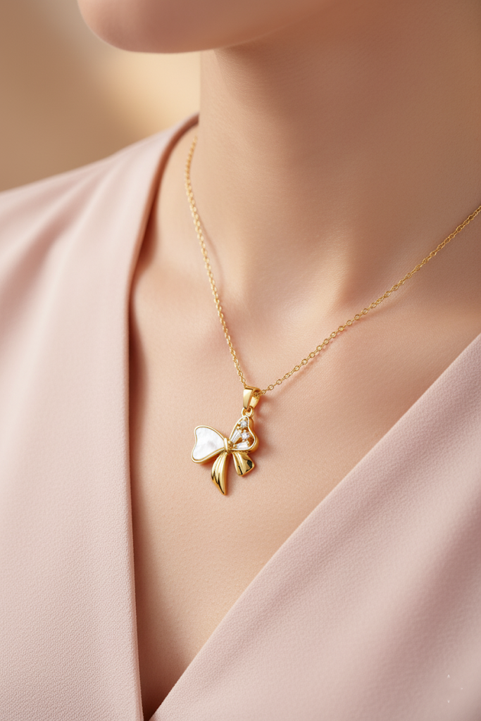 Stainless Steel Crystal Bow Pendant Necklace – Gold