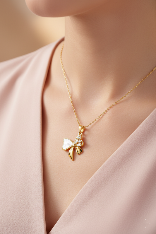 Stainless Steel Crystal Bow Pendant Necklace – Gold