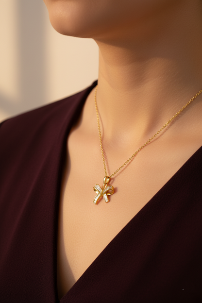 Stainless Steel Crystal Bow Pendant Necklace – Gold