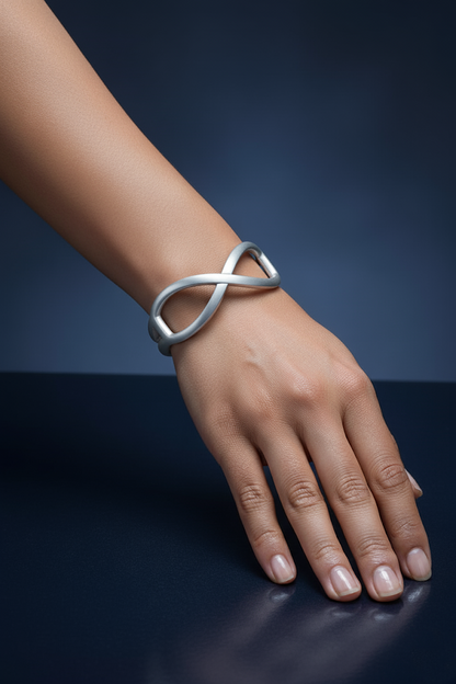 Plated Metal Infinity Design Bracelet – Silver