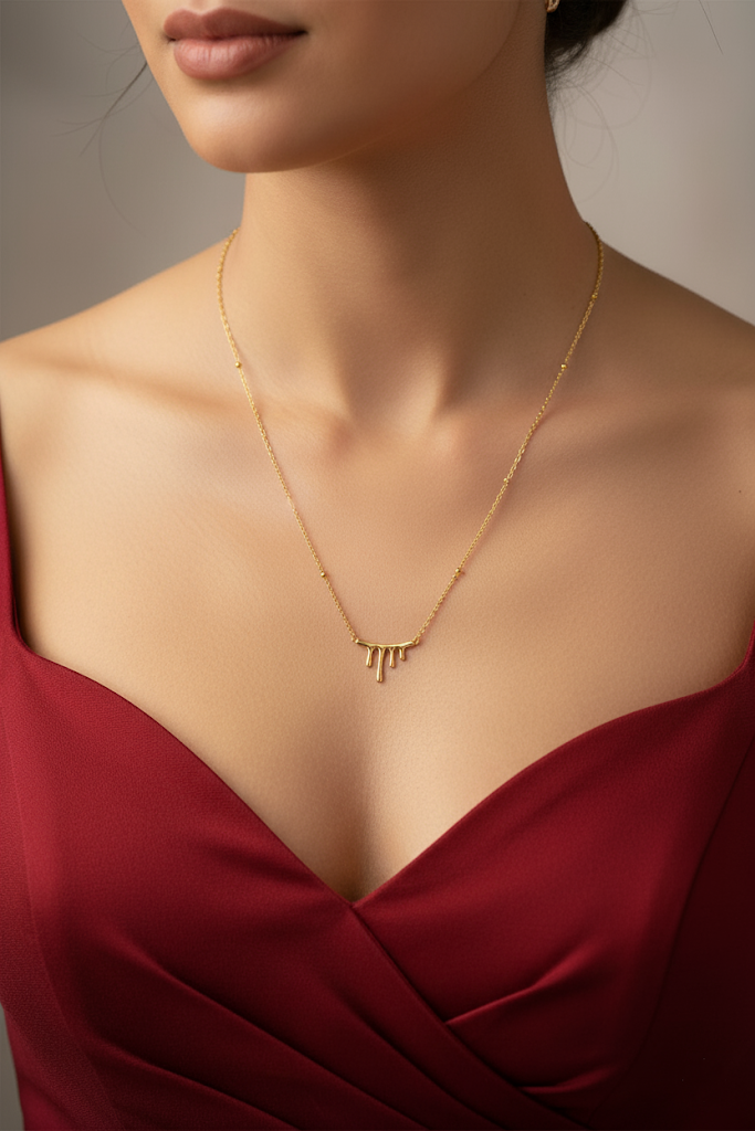 Stainless Steel Flowing Pendant Necklace with Beaded Chain – Gold