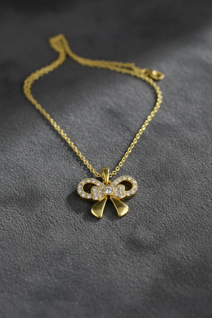 Stainless Steel Crystal Bow Pendant Necklace – Gold