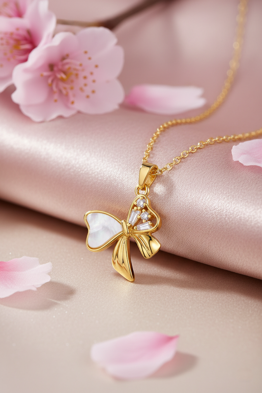 Stainless Steel Crystal Bow Pendant Necklace – Gold