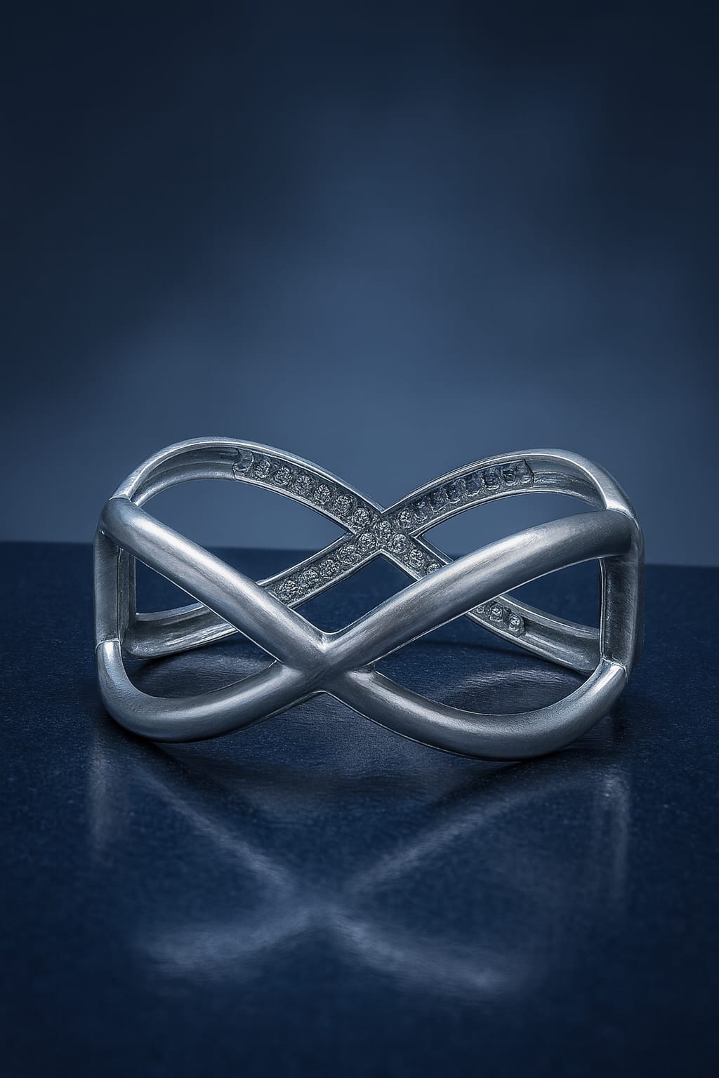 Plated Metal Infinity Design Bracelet – Silver
