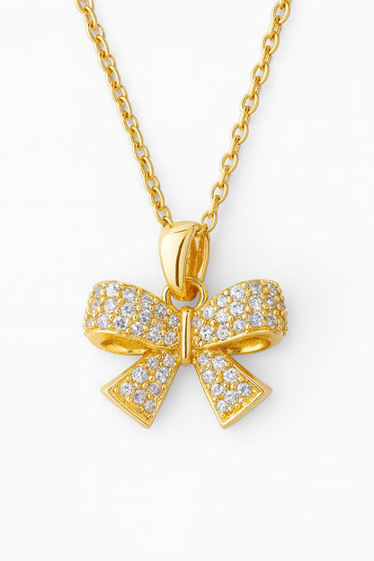 Stainless Steel Crystal Bow Pendant Necklace – Gold