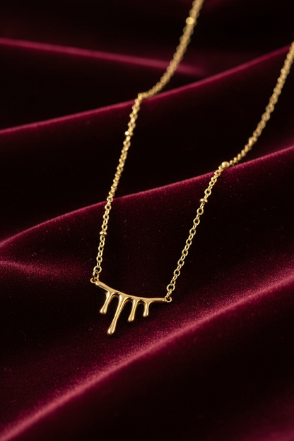 Stainless Steel Flowing Pendant Necklace with Beaded Chain – Gold