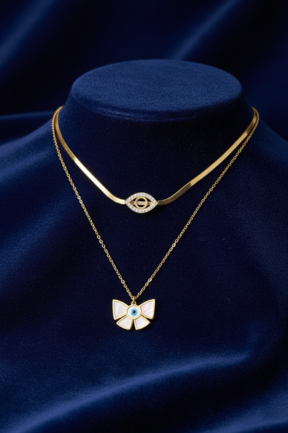 Stainless Steel Layered Necklace Eye and Bow Pendants – Gold